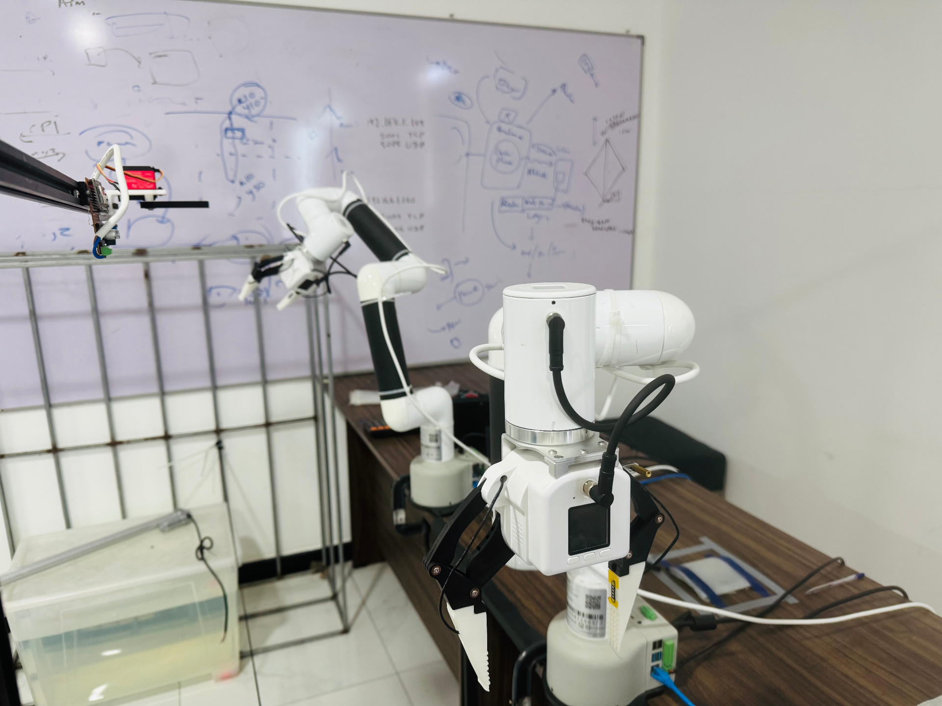 Robotic arm with whiteboard